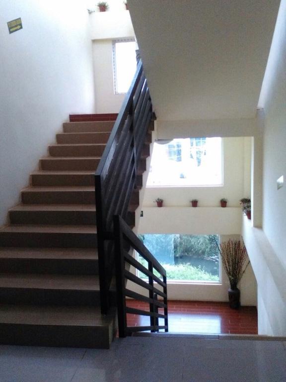 Hotel 99 Pyin Oo Lwin Rom bilde